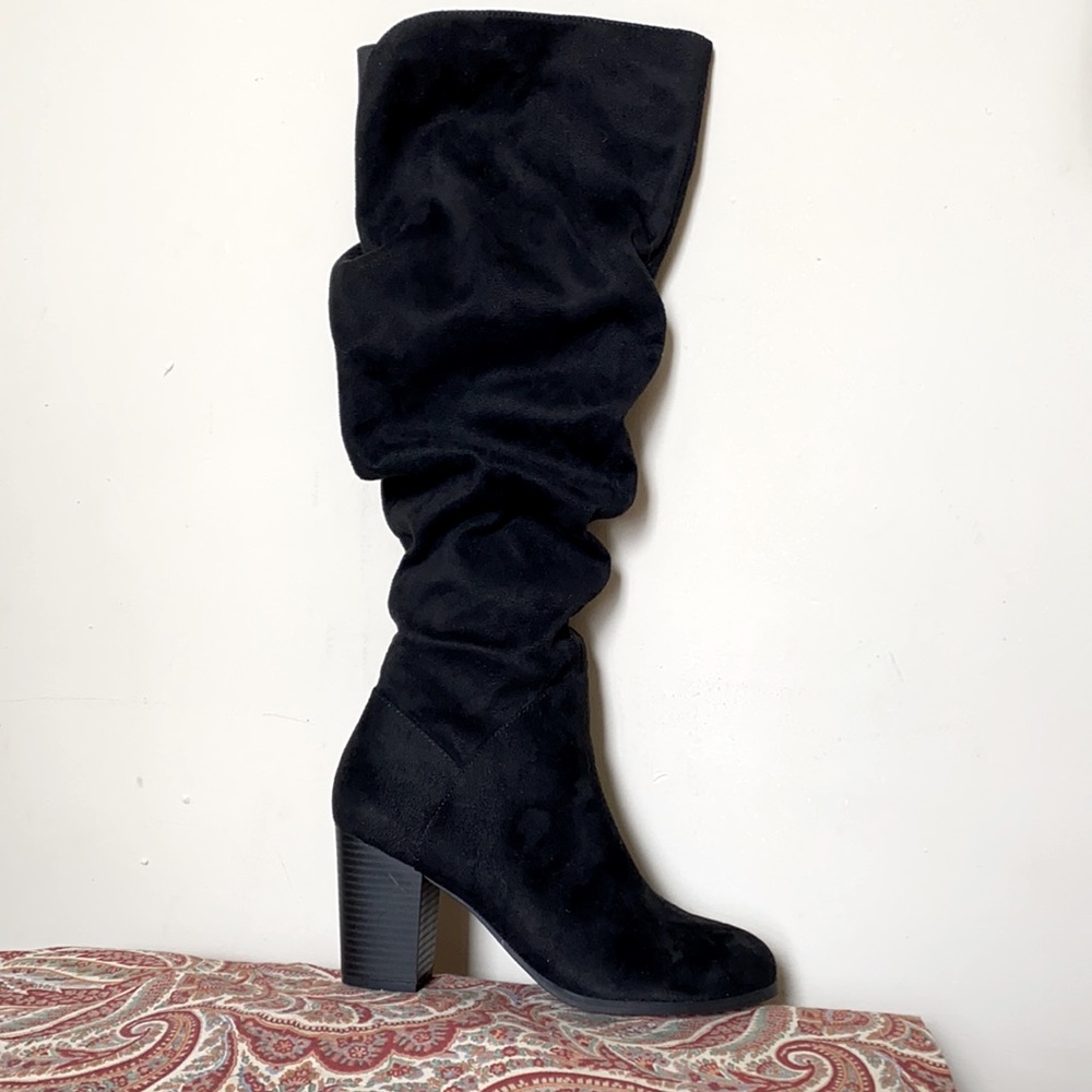 Black tall pull on heel boots